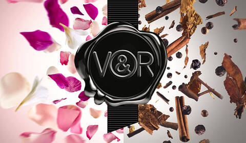 Viktor & Rolf logo with black ribbon and half flowers, half spice assortment